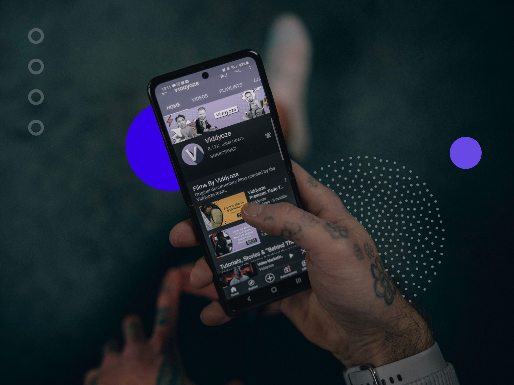 Manholding smartphone. Image being used for an article on the do’s and don’ts of using music in your YouTube Videos.