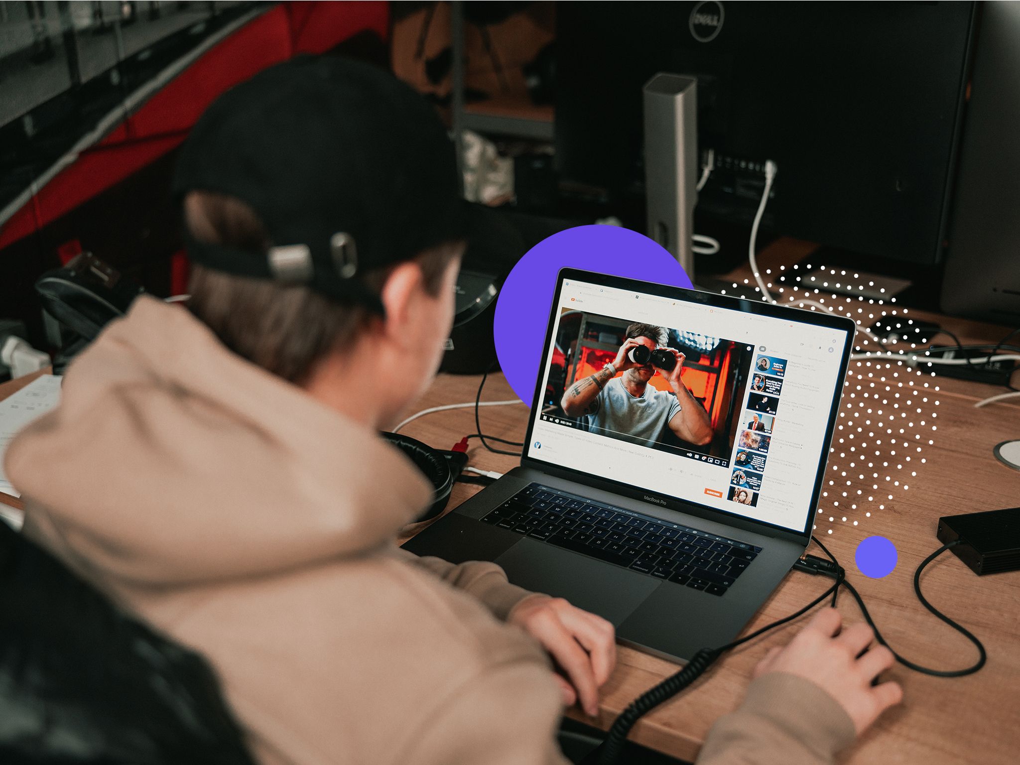 Man watching a YouTube video. Image features in a blog about YouTube SEO.