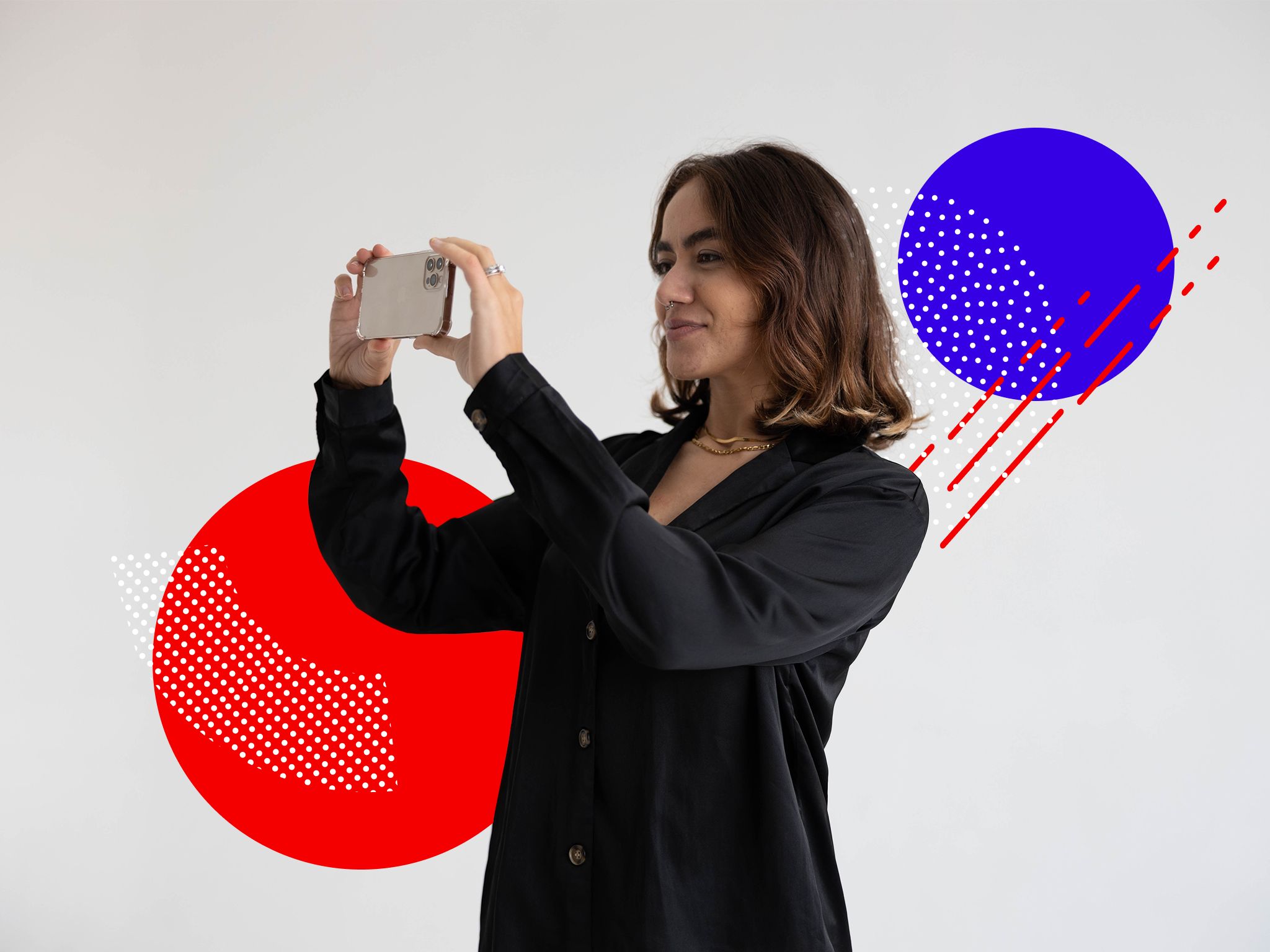 woman looking through phone while filming video content for marketing funnel